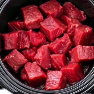 Put raw cubed beef in a slow cooker with these 3 ingredients. You won’t believe how good it tastes.. Full recipe  