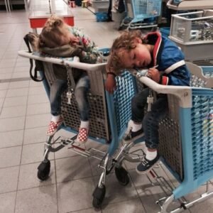 MOM COLLAPSES NEXT TO SLEEPING KIDS IN SHOPPING CART…